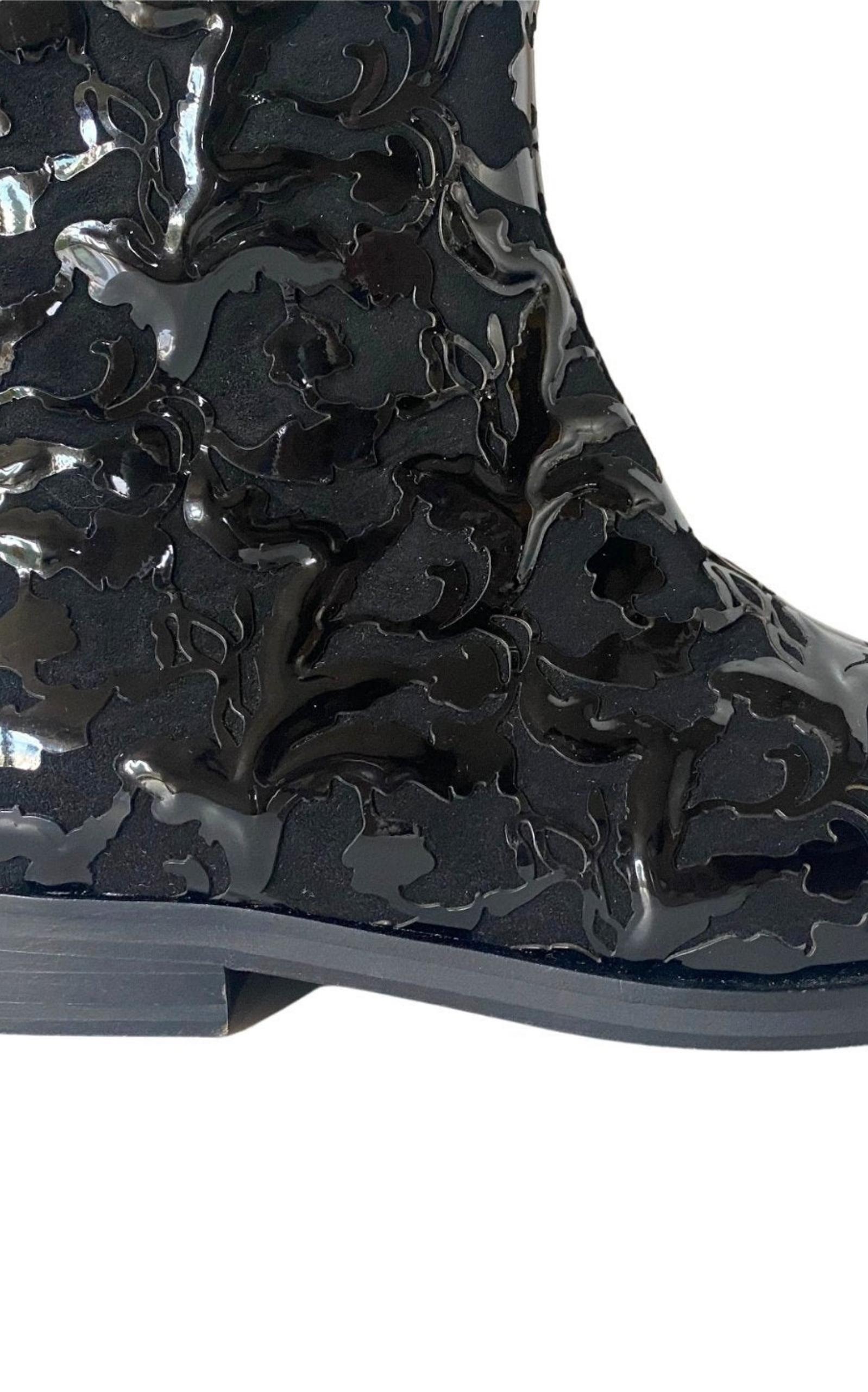  AlaïaBlack Patent Leather Ankle Boots - Runway Catalog