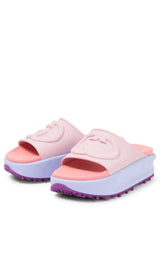 Gucci Miami GG-Embossed Pink Rubber Slides - Runway Catalog