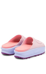 Gucci Miami GG-Embossed Pink Rubber Slides - Runway Catalog